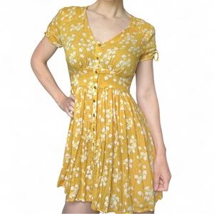 Women’s Billabong yellow floral dress w/ button front & ruched tie arm size S